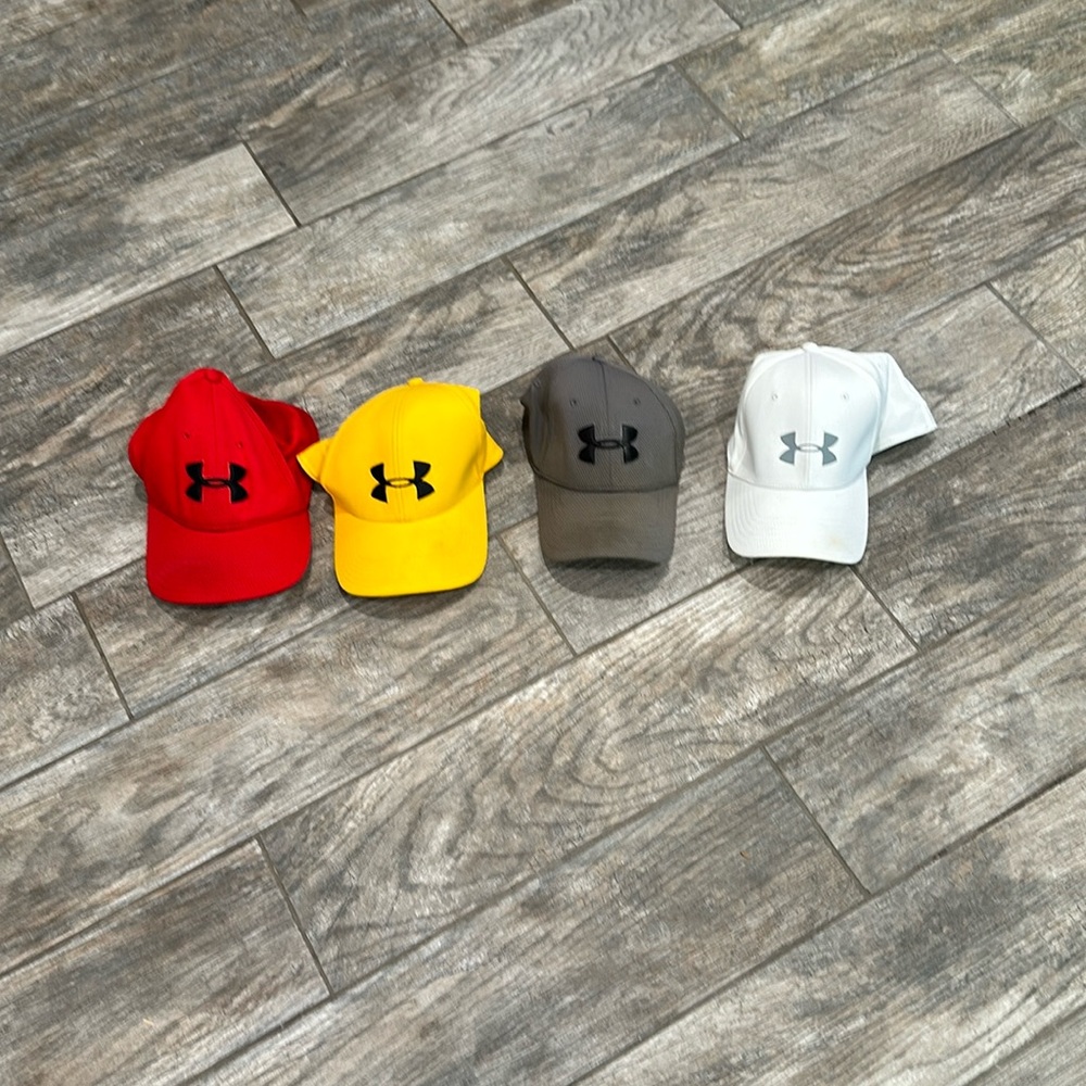Under Armour hats red, yellow, grey, and white size L